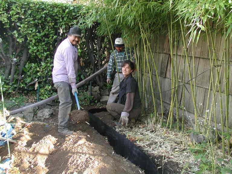 Kerri installing barrier bamboogarden dot com